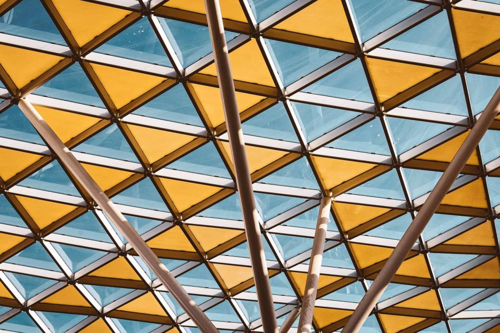 Case Studies: Successful Industrial Projects with Custom Detailing 3 clear and yellow glass ceiling of the building